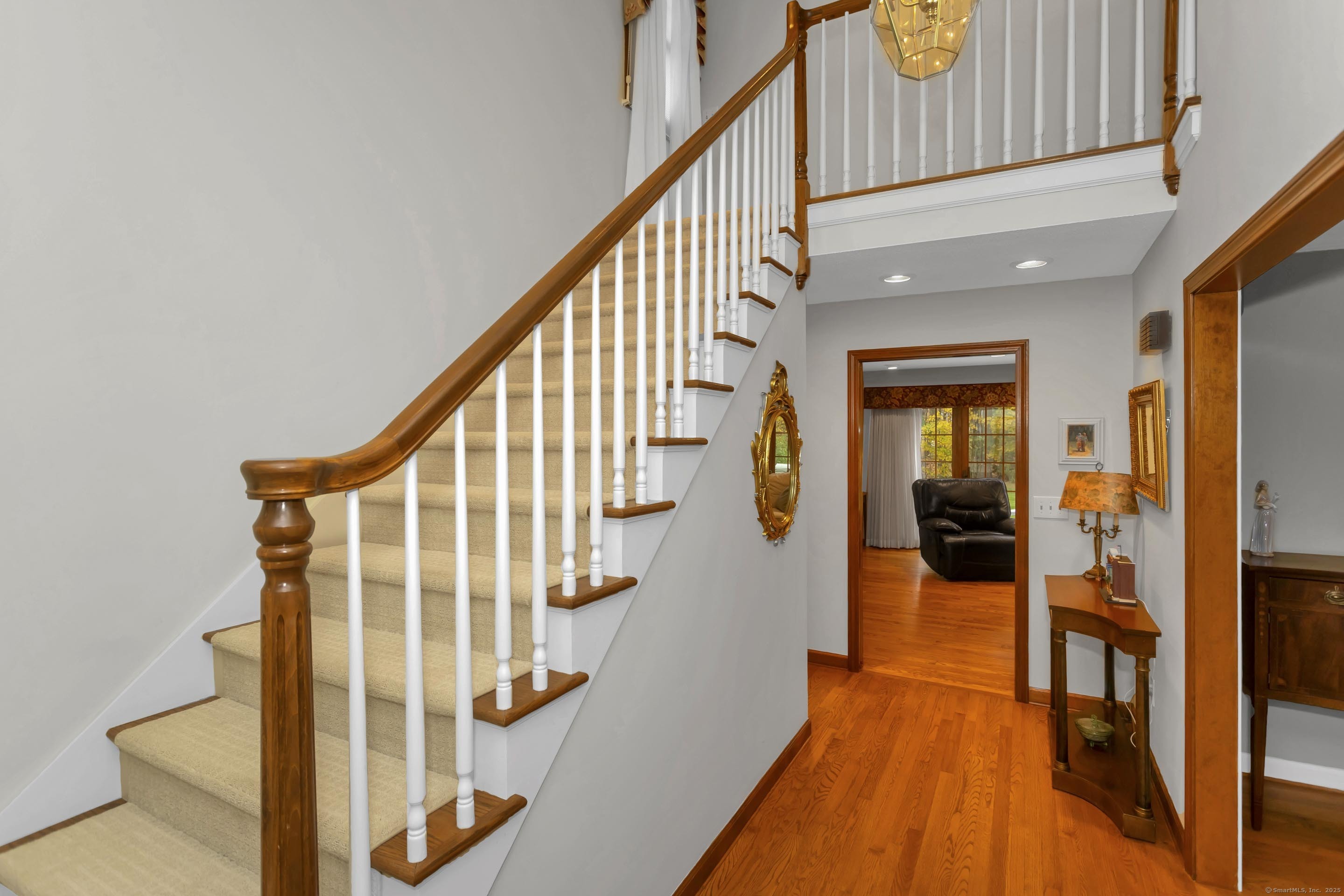 41 Huckleberry Hollow Suffield, CT 06078 - Photo 23 of 40 a view of entryway and hall with wooden floor