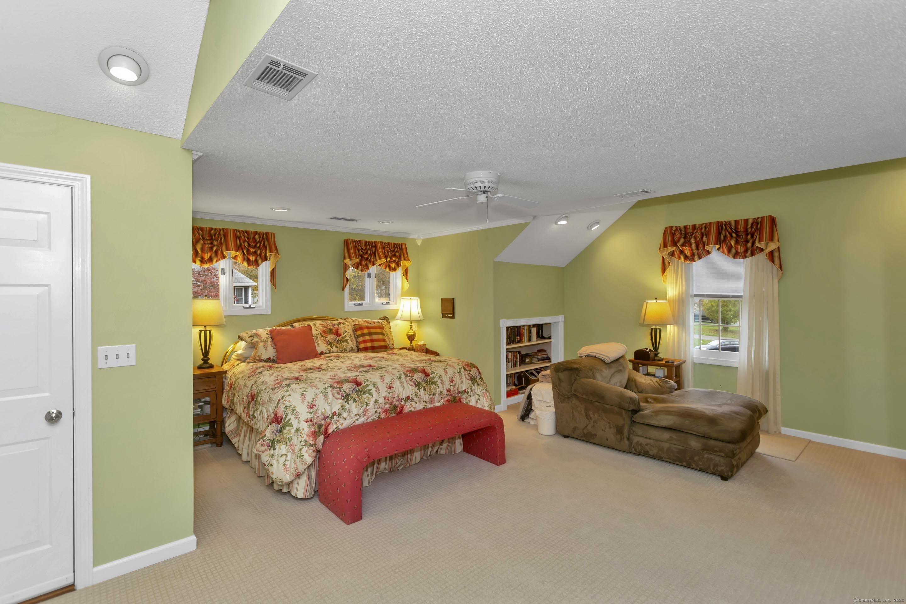 41 Huckleberry Hollow Suffield, CT 06078 - Photo 25 of 40 a spacious bedroom with a bed and ceiling fan