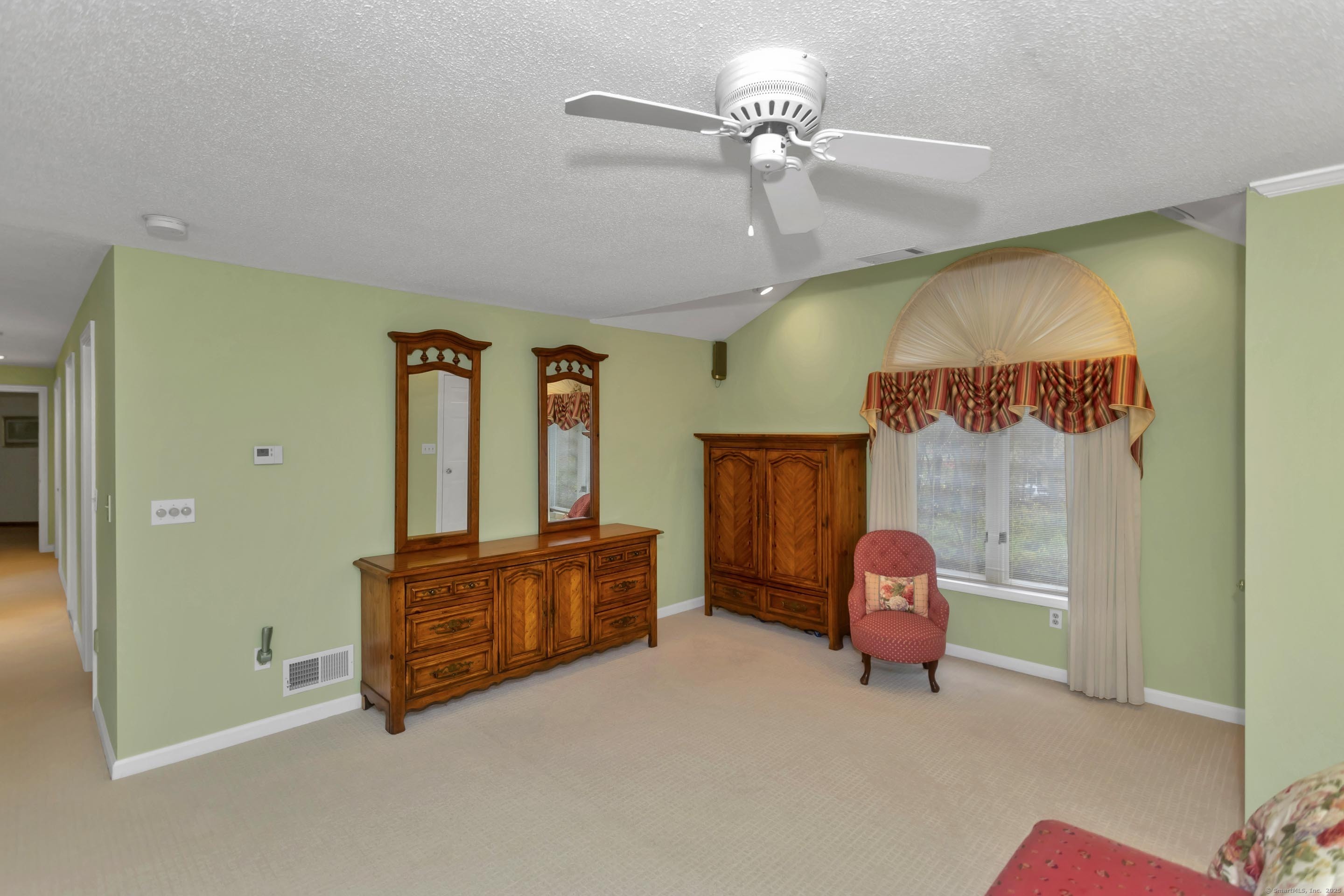 41 Huckleberry Hollow Suffield, CT 06078 - Photo 26 of 40 a bed room with furniture and a window