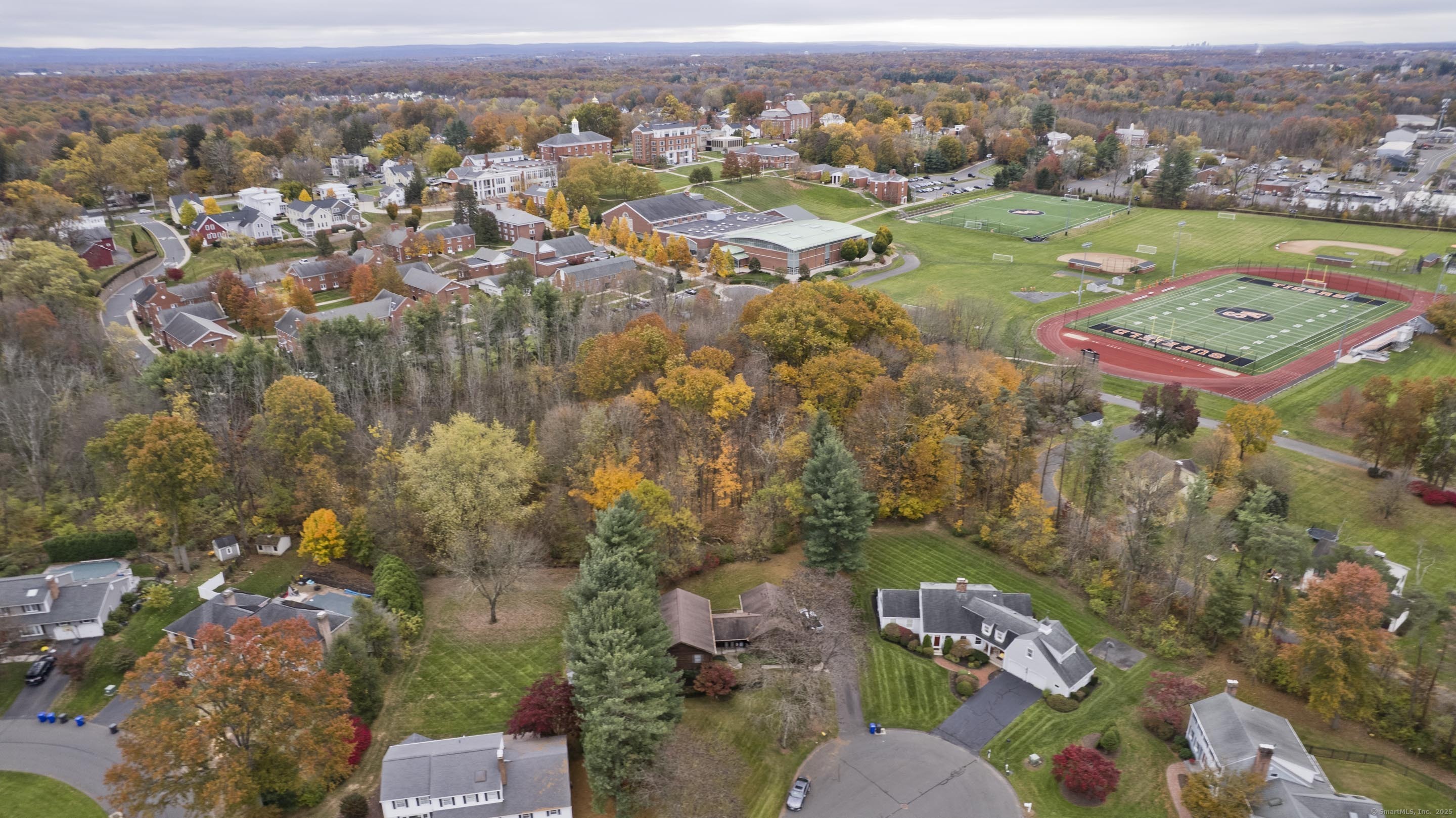 41 Huckleberry Hollow Suffield, CT 06078 - Photo 4 of 40 an aerial view of a city with lots of residential buildings