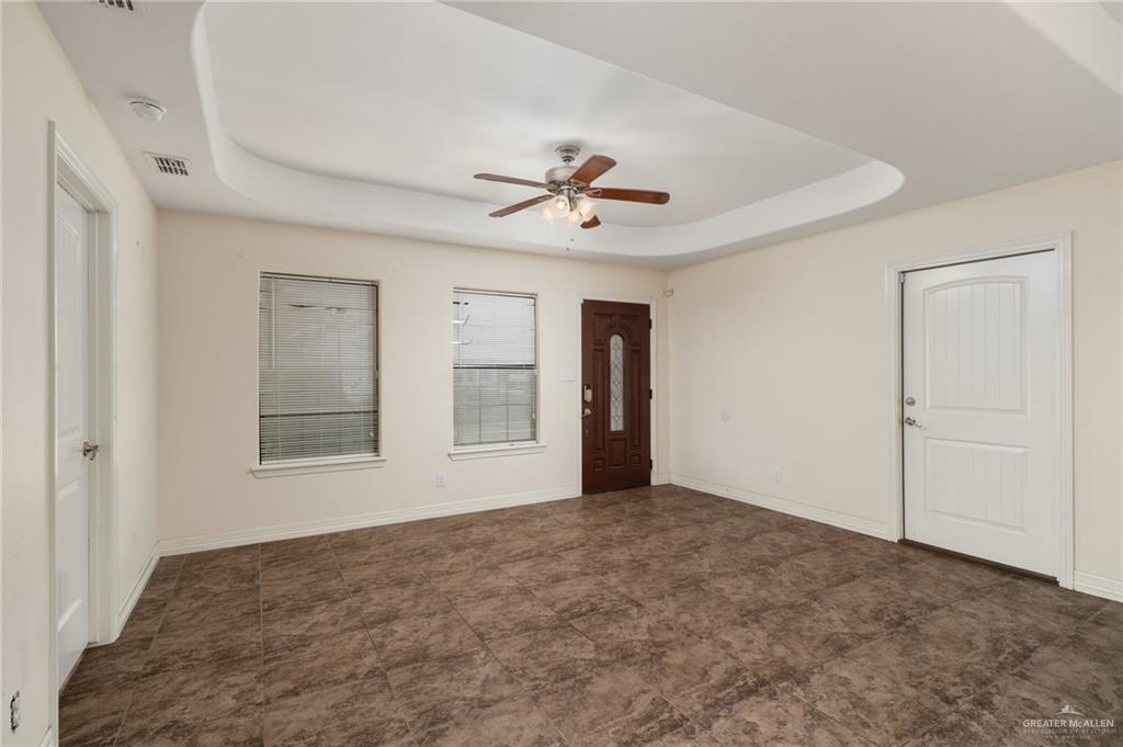 417 Jessica Street Mercedes, TX 78570 - Photo 2 of 12 a view of an empty room with a window
