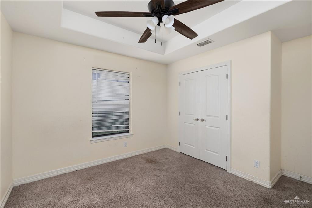 417 Jessica Street Mercedes, TX 78570 - Photo 9 of 12 a view of room with ceiling fan
