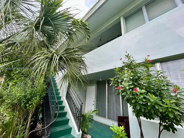 a plant that is in front of a house