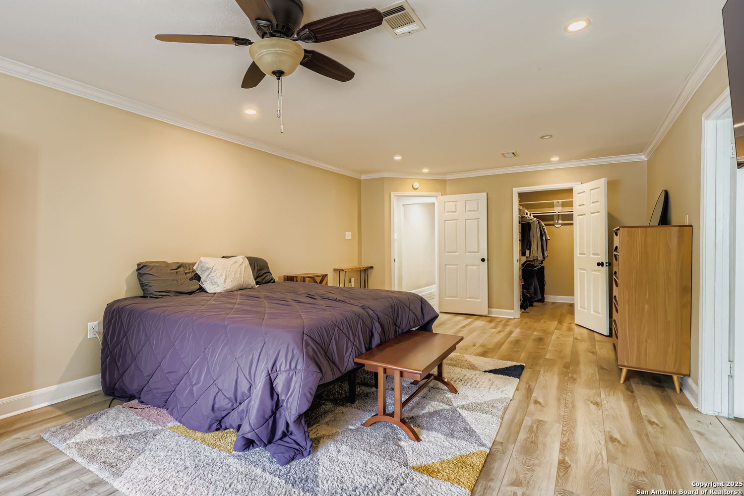 800 Terrell Road San Antonio, TX 78209 - Photo 12 of 28 a spacious bedroom with a bed and ceiling fan