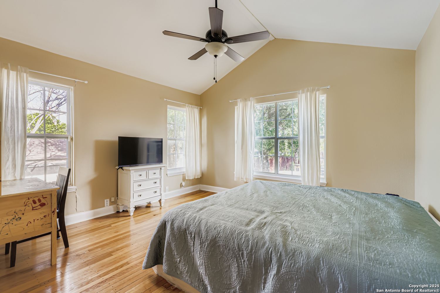 800 Terrell Road San Antonio, TX 78209 - Photo 16 of 28 a bedroom with a bed and a flat screen tv