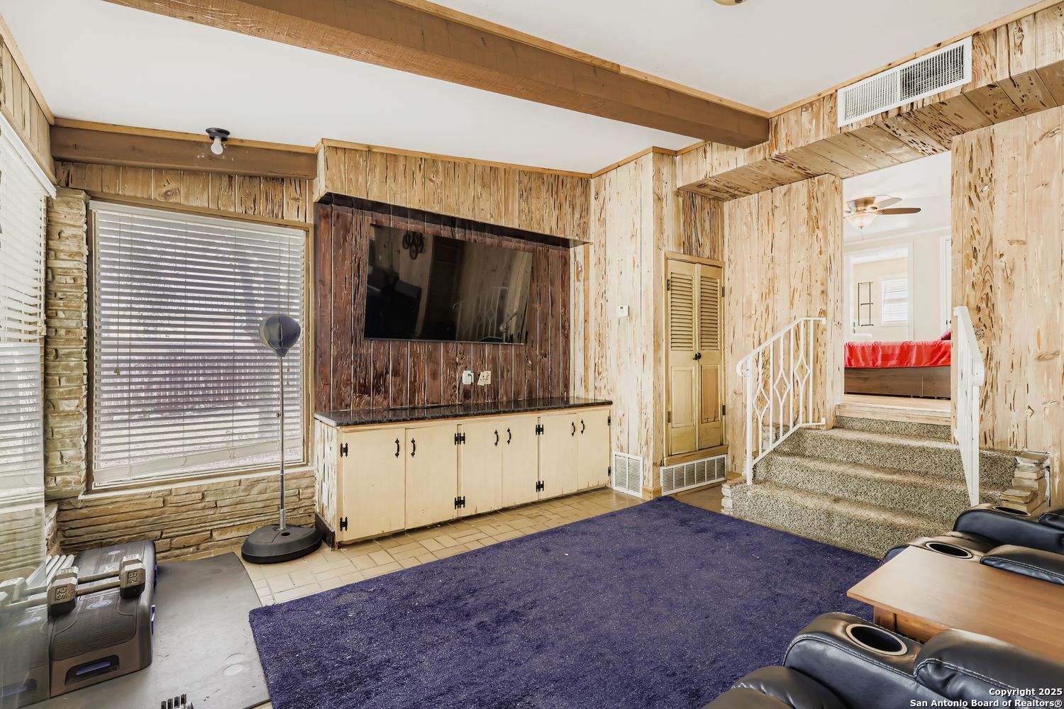 800 Terrell Road San Antonio, TX 78209 - Photo 20 of 28 a living room with furniture flat screen tv and a window