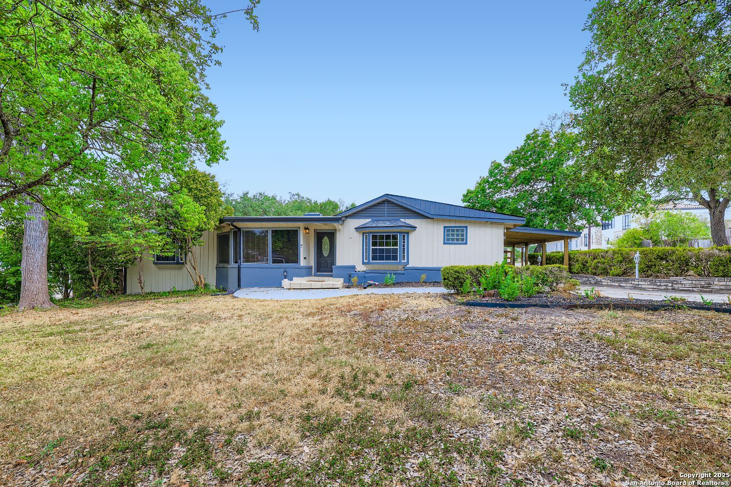 800 Terrell Road San Antonio, TX 78209 - Photo 5 of 28 a front view of a house with a garden
