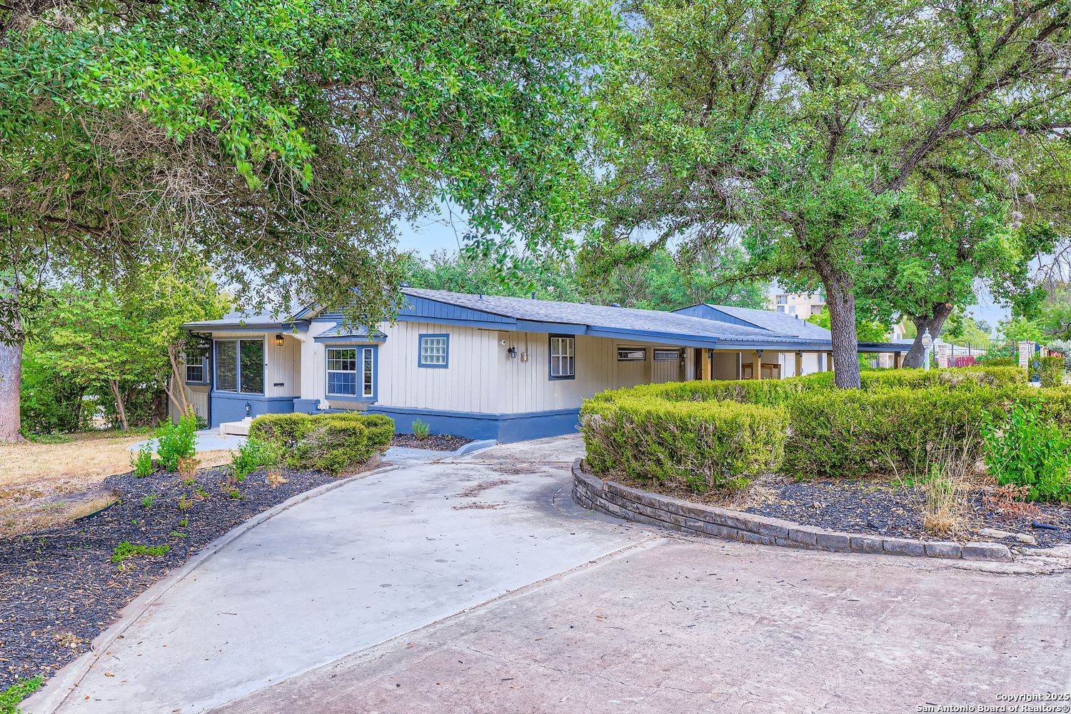 800 Terrell Road San Antonio, TX 78209 - Photo 6 of 28 a front view of a house with a garden