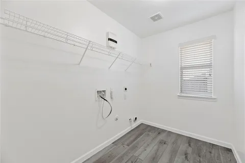 a view of a room with racks on the wall