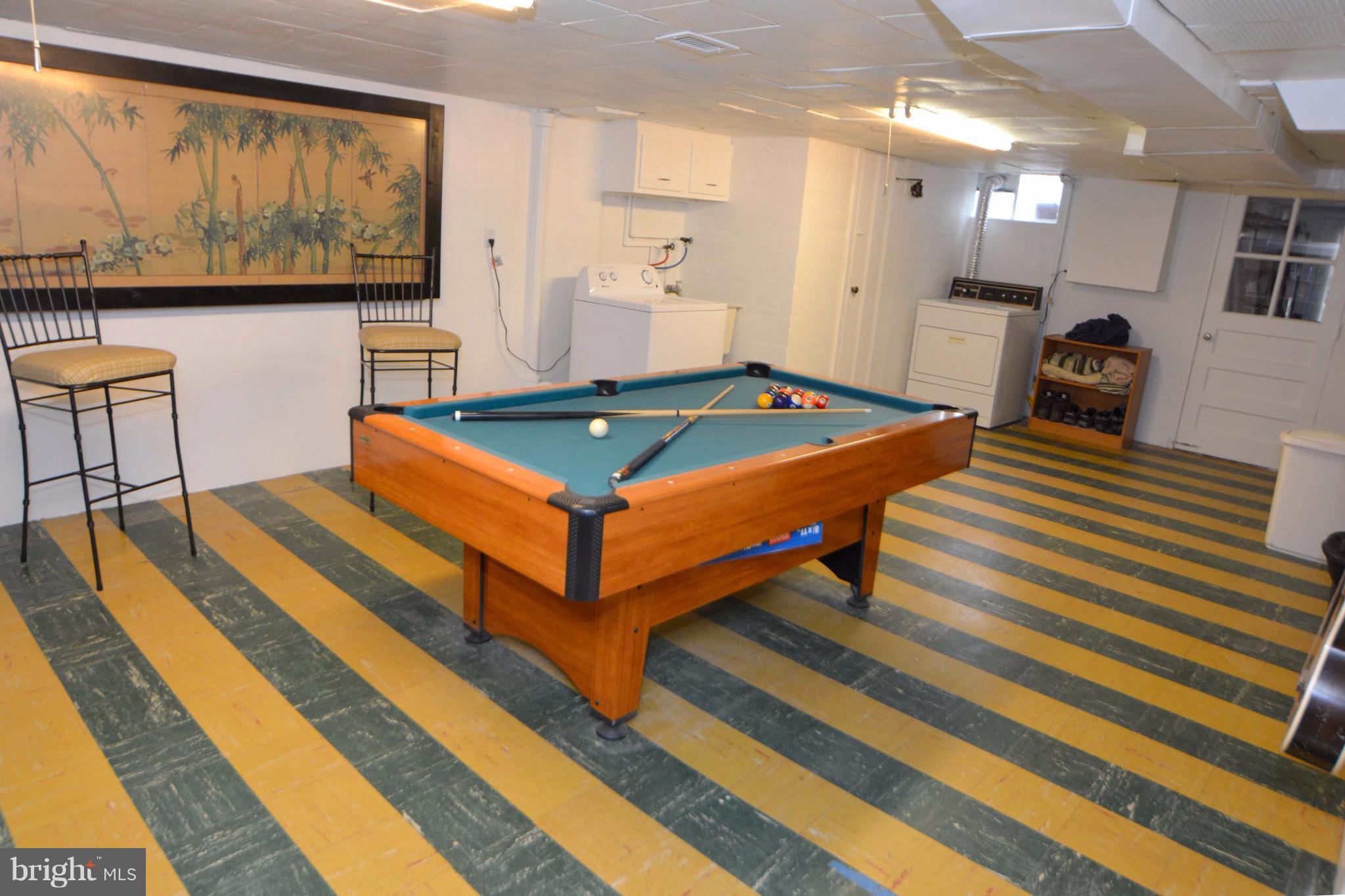 1738 Amuskai Road Baltimore, MD 21234 - Photo 18 of 20 a room with wooden floor pool table and windows
