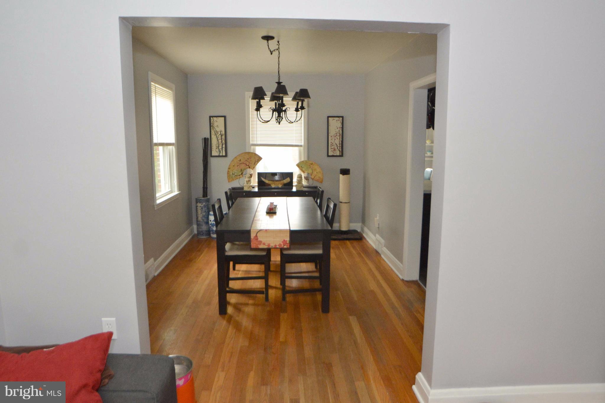 1738 Amuskai Road Baltimore, MD 21234 - Photo 4 of 20 a view of a dining room with furniture and wooden floor