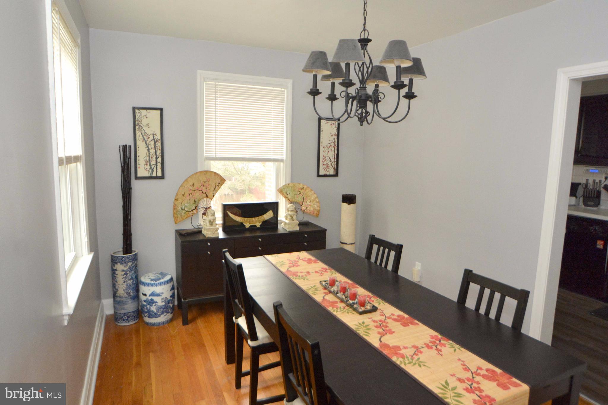1738 Amuskai Road Baltimore, MD 21234 - Photo 7 of 20 a view of a dining room with furniture and chandelier