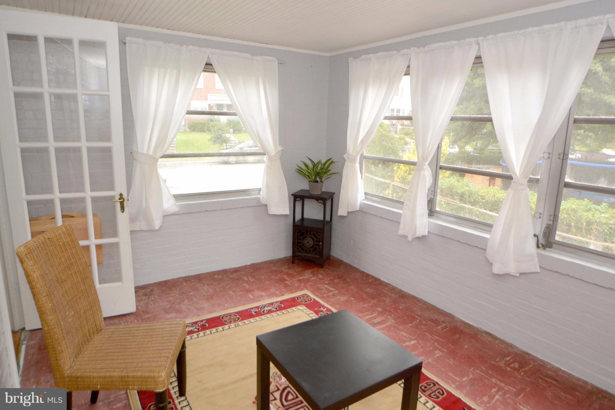 1738 Amuskai Road Baltimore, MD 21234 - Photo 8 of 20 a living room with furniture and a window