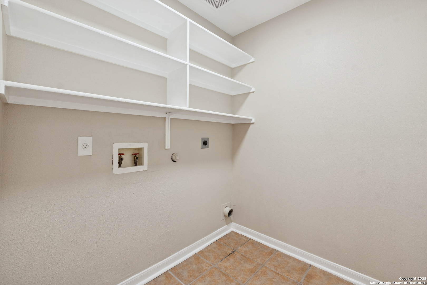 1815 Indian Paint Brush Road San Antonio, TX 78232 - Photo 33 of 38 a view of a room with shelf