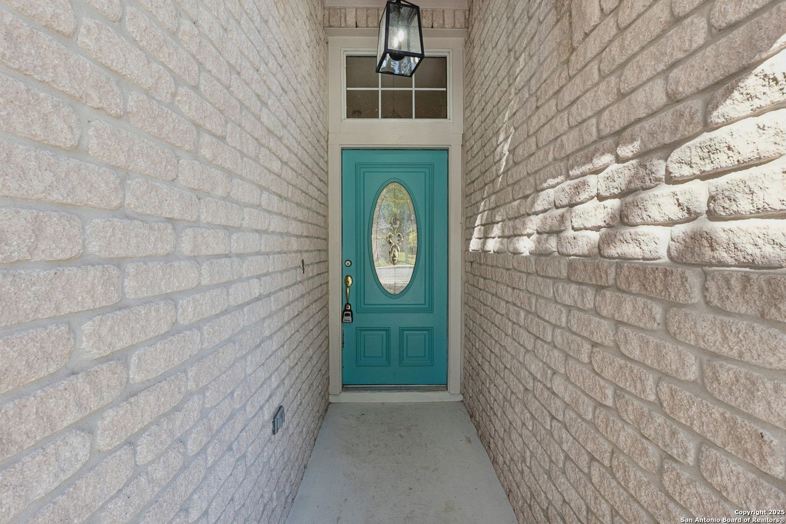 1815 Indian Paint Brush Road San Antonio, TX 78232 - Photo 4 of 38 a view of a hallway with entryway door
