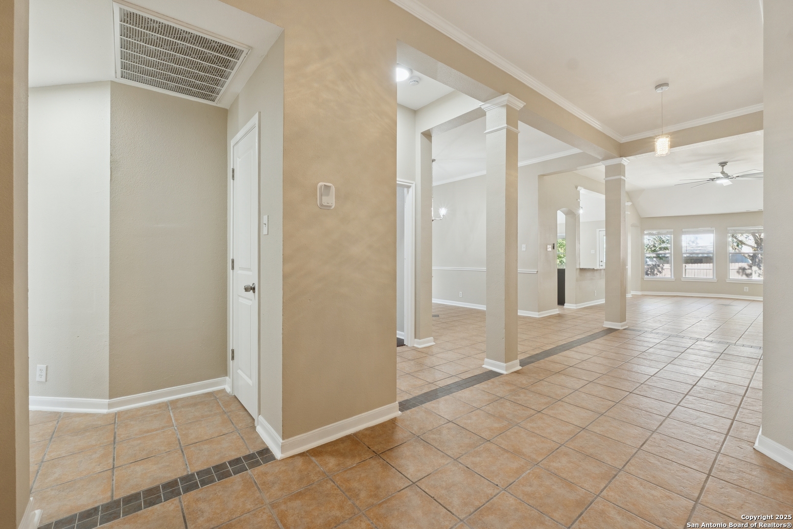 1815 Indian Paint Brush Road San Antonio, TX 78232 - Photo 6 of 38 a view of a hallway with wooden cabinets