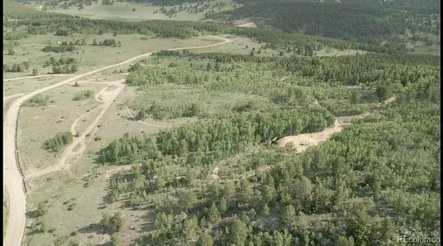 a view of a lake with a mountain
