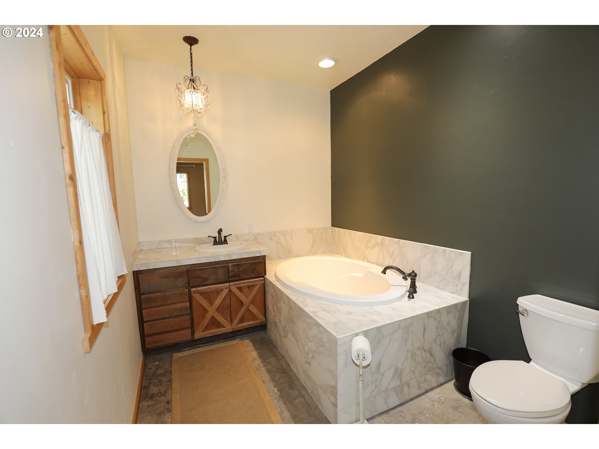 6910 Upper Olalla Road Winston, OR 97496 - Photo 14 of 48 a bathroom with a sink and a mirror