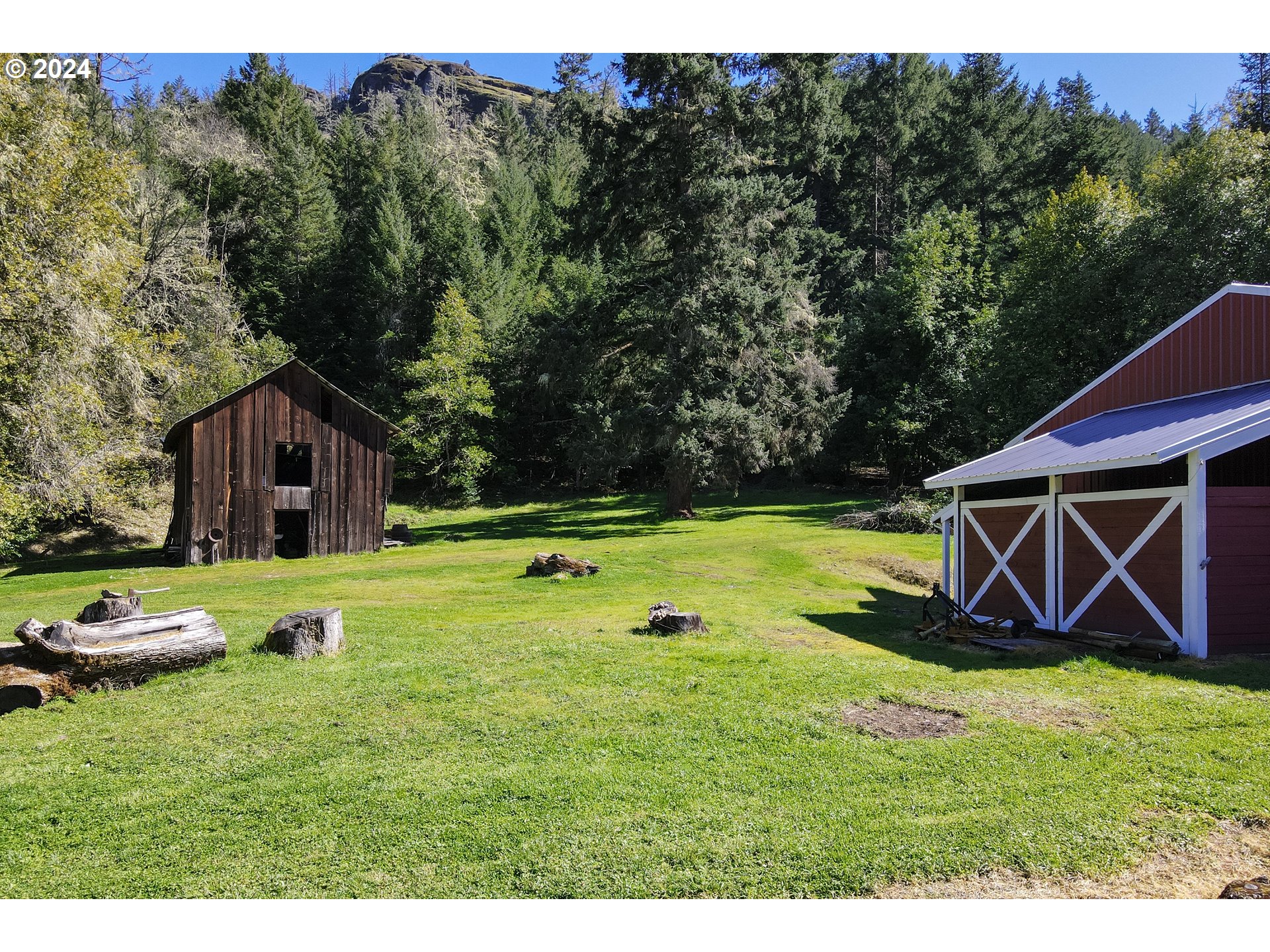 6910 Upper Olalla Road Winston, OR 97496 - Photo 30 of 48 a house view with a swimming pool