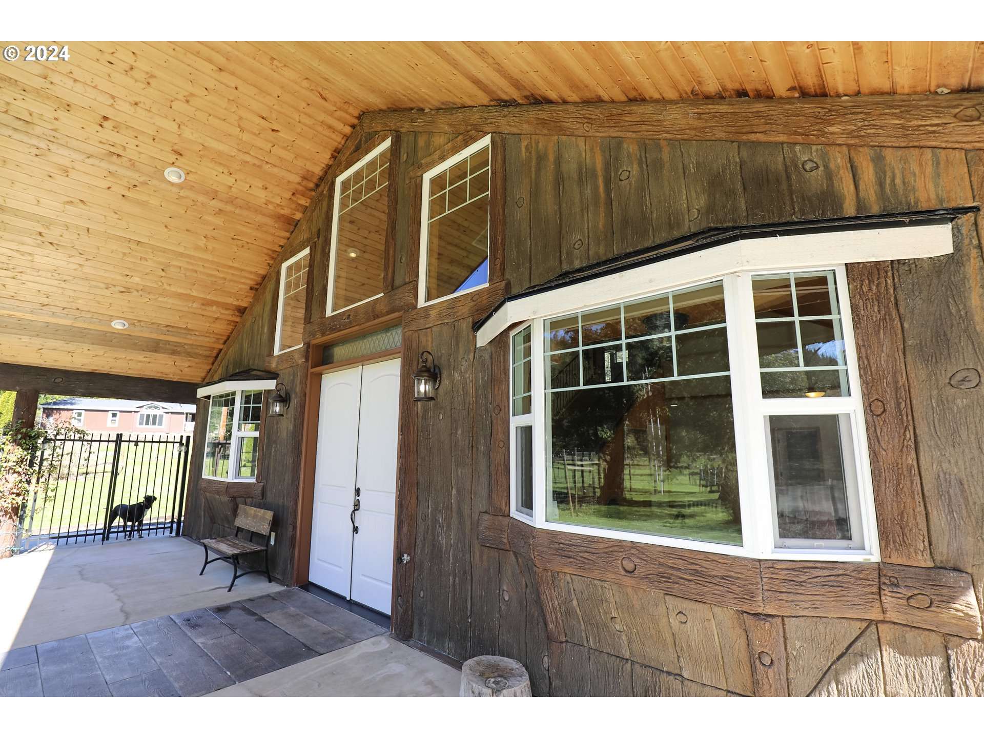 6910 Upper Olalla Road Winston, OR 97496 - Photo 3 of 48 a view of a house with a window