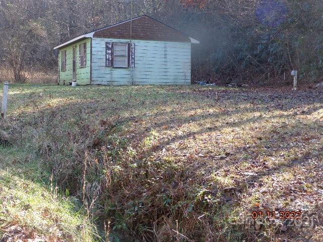 90 Cline Branch Road Bryson City, NC 28713 - Photo 10 of 11 a view of a house with a yard