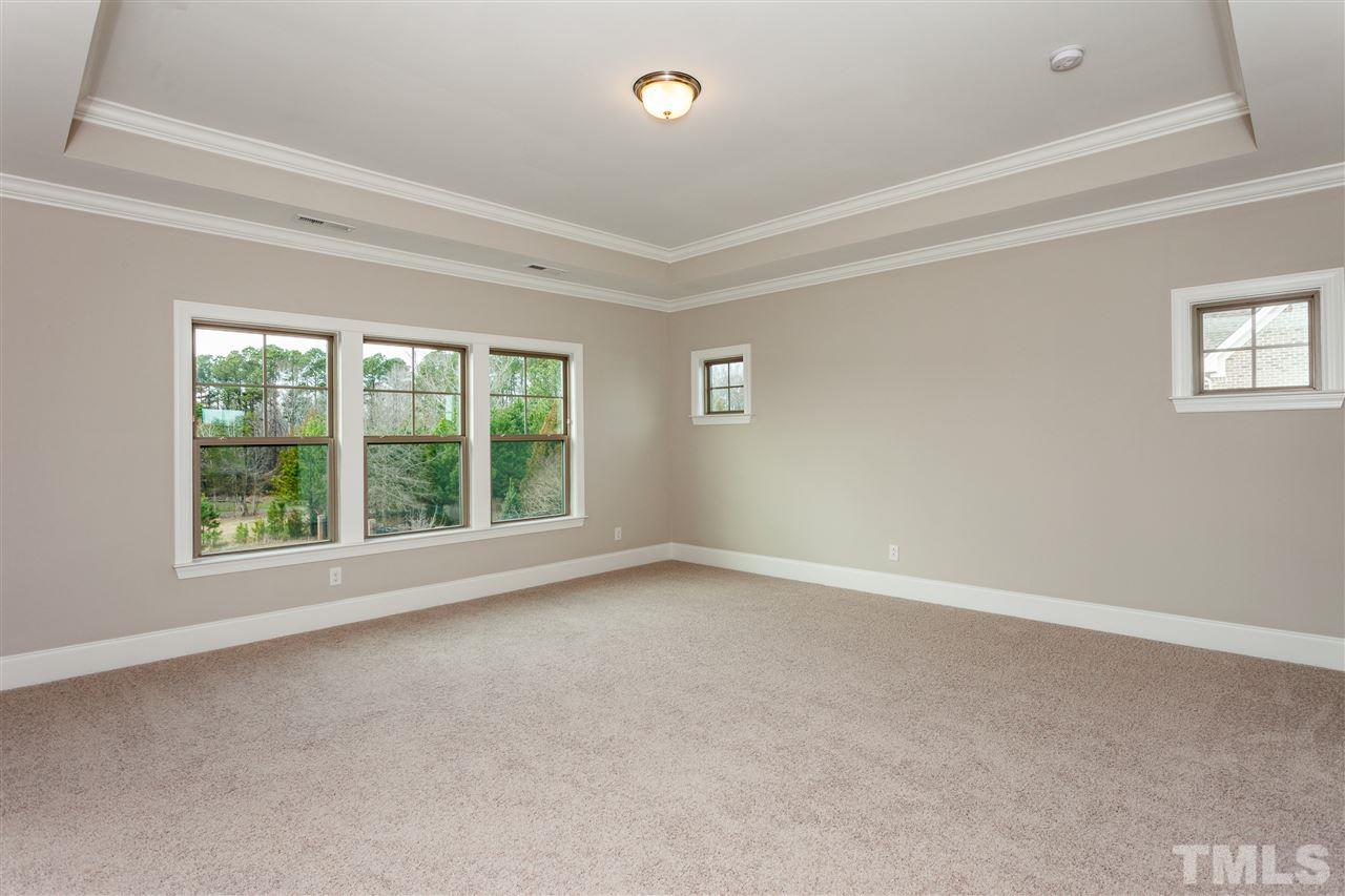 3316 Cotten Road, Unit 83 Raleigh, NC 27603 - Photo 11 of 21 an empty room with a window