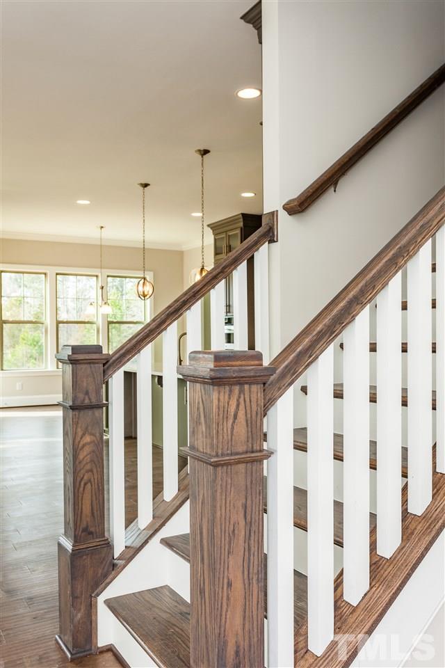 3316 Cotten Road, Unit 83 Raleigh, NC 27603 - Photo 6 of 21 a view of entryway with wooden floor and stairs