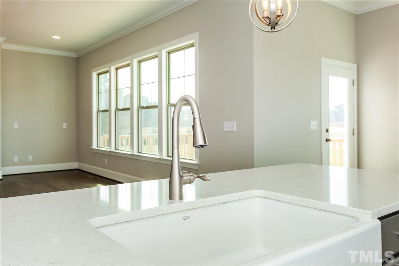 3316 Cotten Road, Unit 83 Raleigh, NC 27603 - Photo 9 of 21 a bathroom with a bathtub and a shower