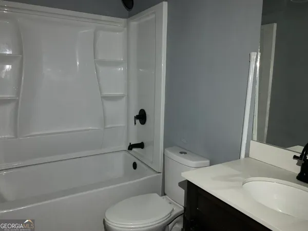 a view of room with walk in closet