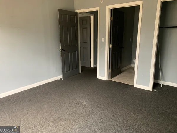 an empty room with closet