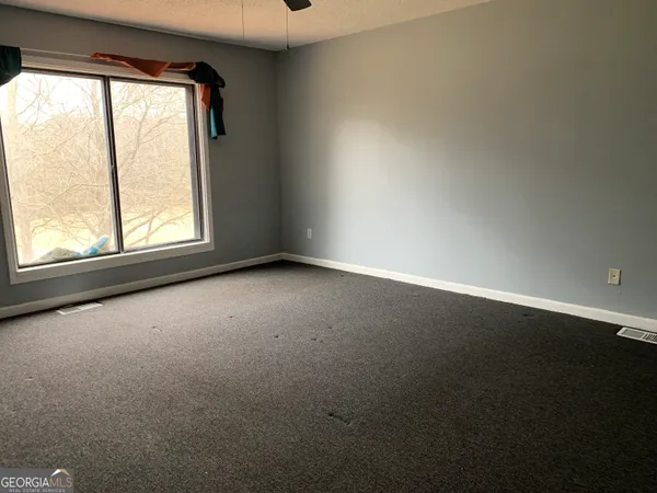 an empty room with a window