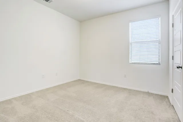 a bathroom with a sink vanity and mirror