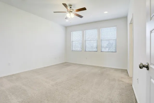 a bathroom with a bathtub a sink and a mirror