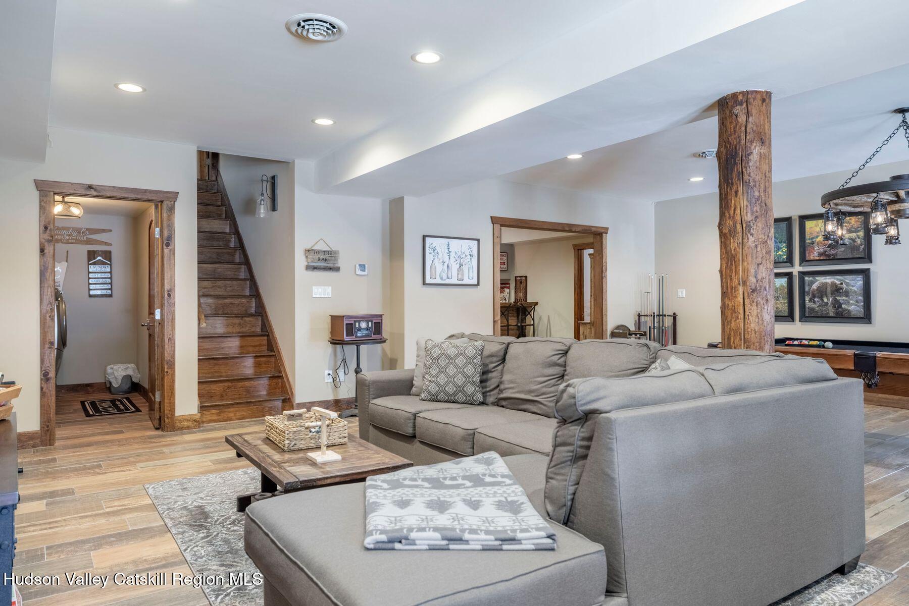 85 Conifer Lake Road West Jewett, NY 12444 - Photo 29 of 50 a living room with furniture and wooden floor