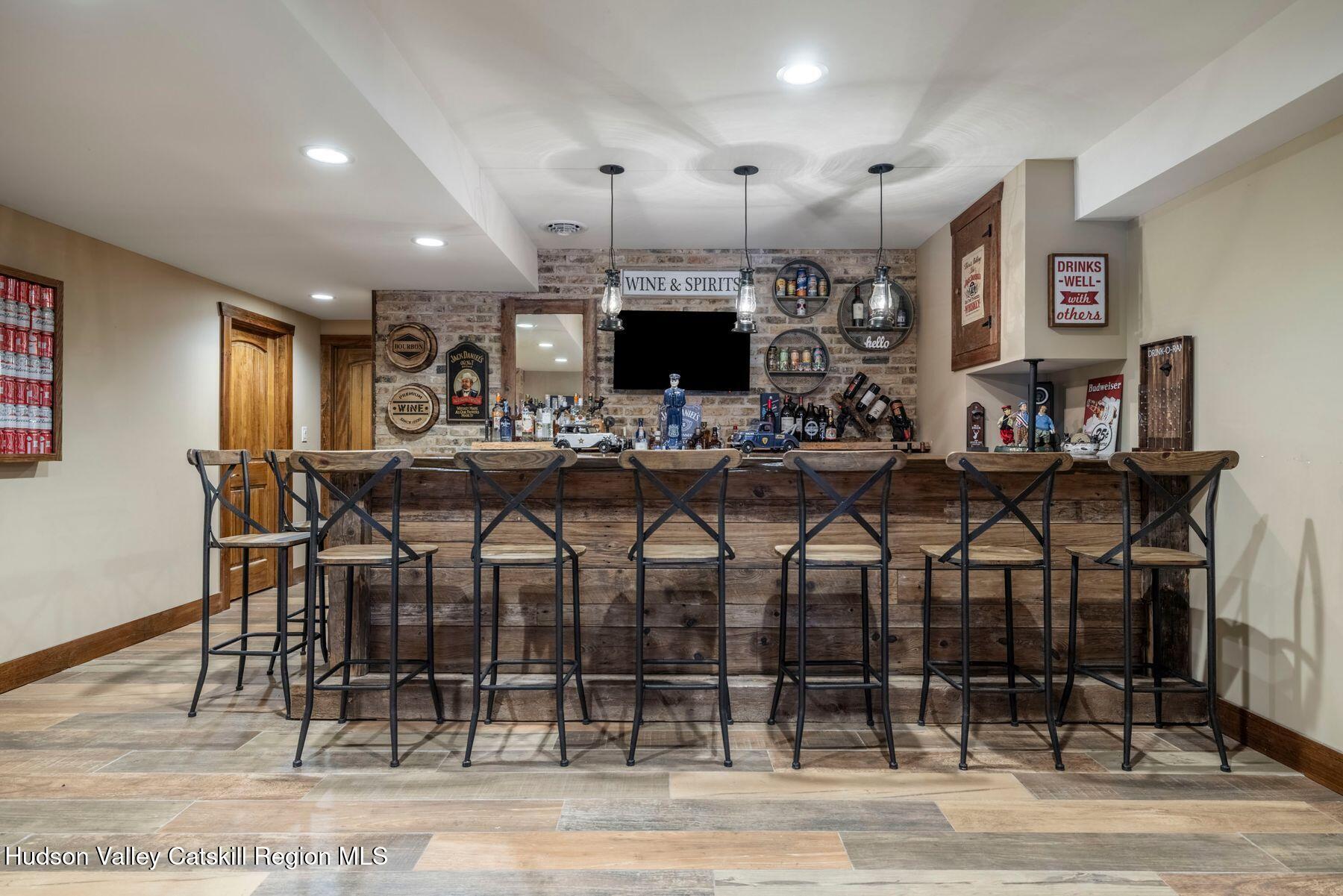 85 Conifer Lake Road West Jewett, NY 12444 - Photo 33 of 50 a view of a dining room with furniture and wooden floor
