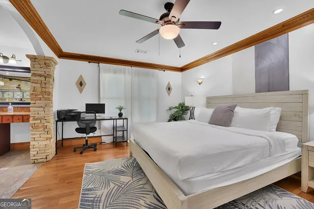 a bed room with a bed and window