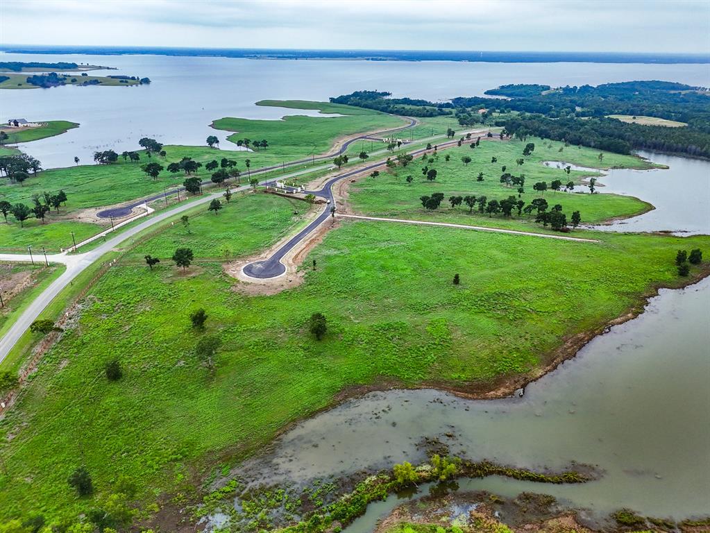 204 Lakeshore Lane Windom, TX 75492 - Photo 15 of 40 Drone / aerial view of a large body of water