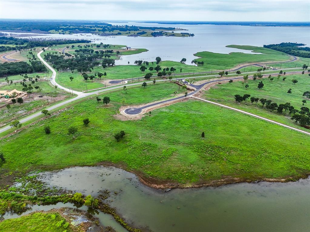 204 Lakeshore Lane Windom, TX 75492 - Photo 19 of 40 Drone / aerial view of a large body of water