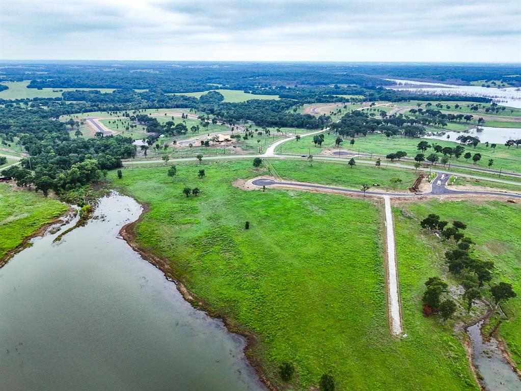 204 Lakeshore Lane Windom, TX 75492 - Photo 24 of 40 Aerial view of sparsely populated area with a large body of water