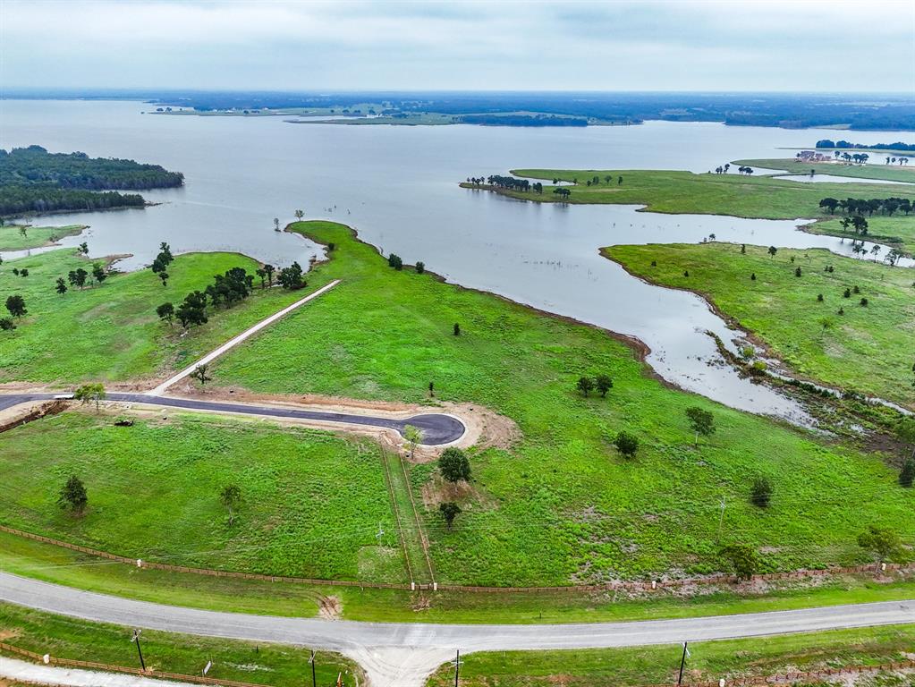 204 Lakeshore Lane Windom, TX 75492 - Photo 3 of 40 Drone / aerial view of a nearby body of water