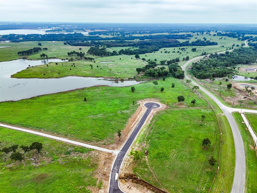 204 Lakeshore Lane Windom, TX 75492 - Photo 32 of 40 View of rural area featuring a nearby body of water