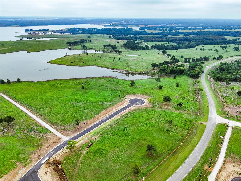 204 Lakeshore Lane Windom, TX 75492 - Photo 34 of 40 Aerial overview of property's location with a large body of water and rural landscape