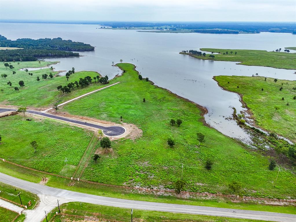 204 Lakeshore Lane Windom, TX 75492 - Photo 6 of 40 Drone / aerial view of a large body of water