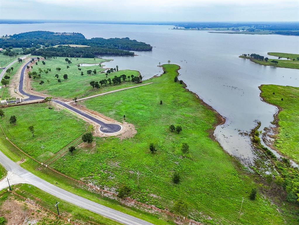 204 Lakeshore Lane Windom, TX 75492 - Photo 7 of 40 Aerial overview of property's location with a nearby body of water