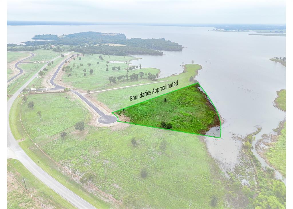 204 Lakeshore Lane Windom, TX 75492 - Photo 8 of 40 Aerial overview of property's location featuring a large body of water and property parcel outlined