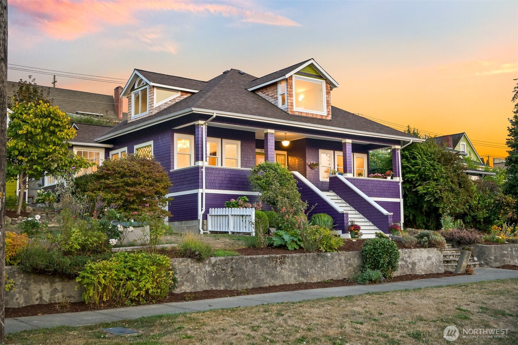 front view of a house with a small yard