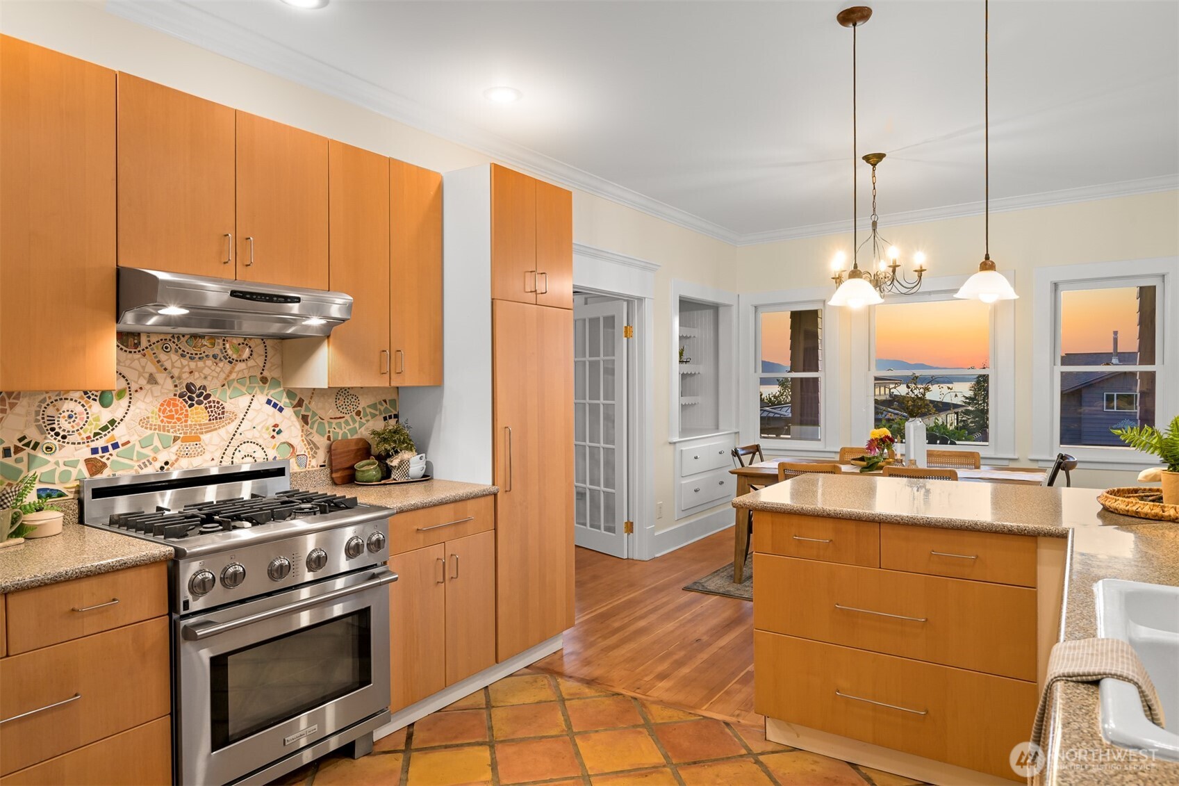 903 13th Street Bellingham, WA 98225 - Photo 20 of 40 a kitchen with a stove a refrigerator and a sink