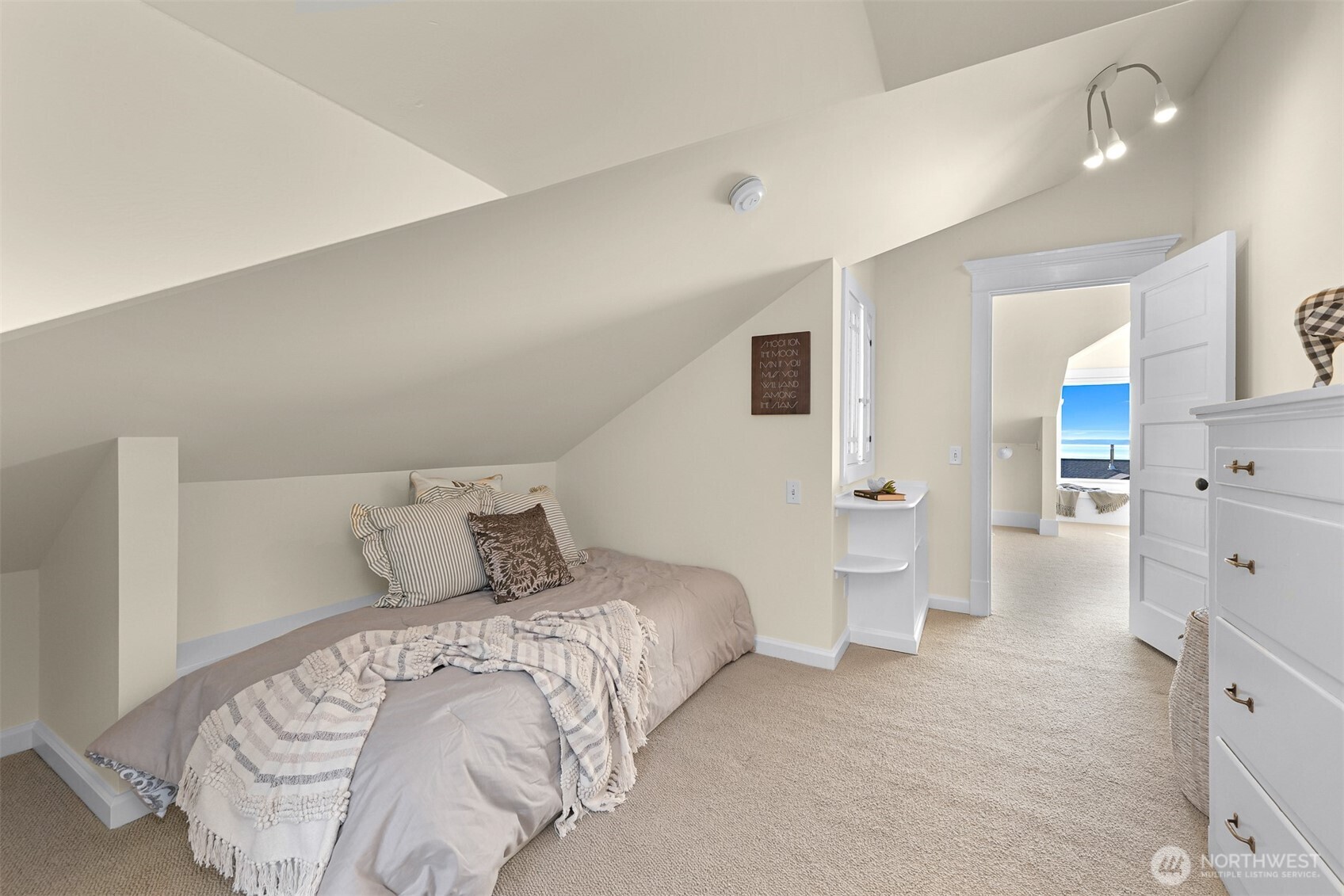 903 13th Street Bellingham, WA 98225 - Photo 32 of 40 a bedroom with a bed and cabinets