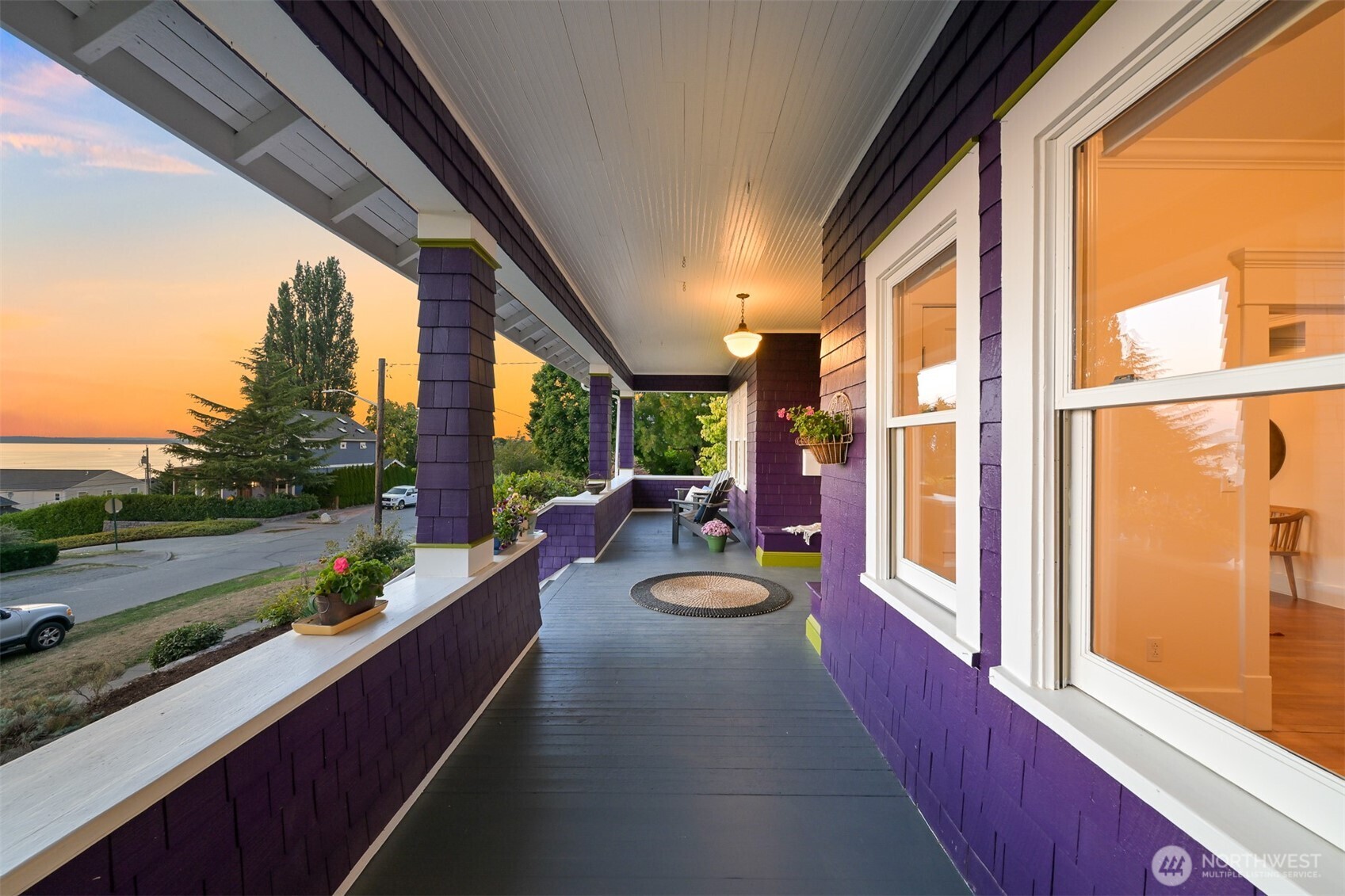 903 13th Street Bellingham, WA 98225 - Photo 39 of 40 a view of a balcony with chair and wooden floor