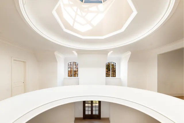 a view of house with yard and entertaining space